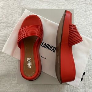 Labucq Caye Slides in Tangerine Size 39